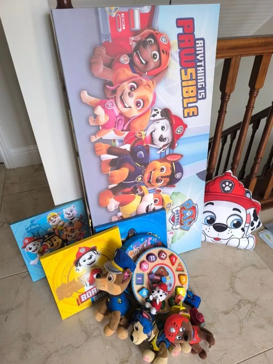 Selection of Paw Patrol toys, pictures, clock
