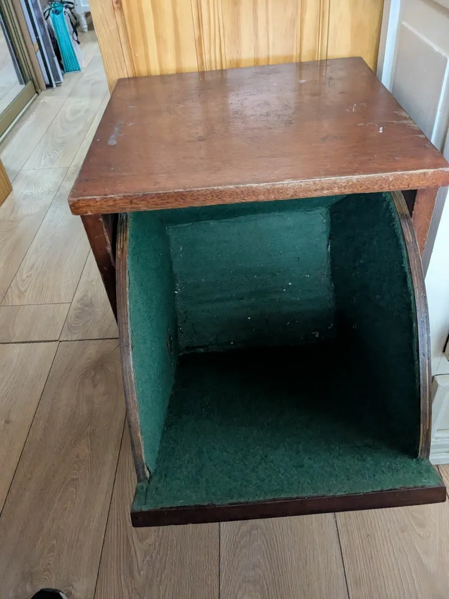 A wooden coal box