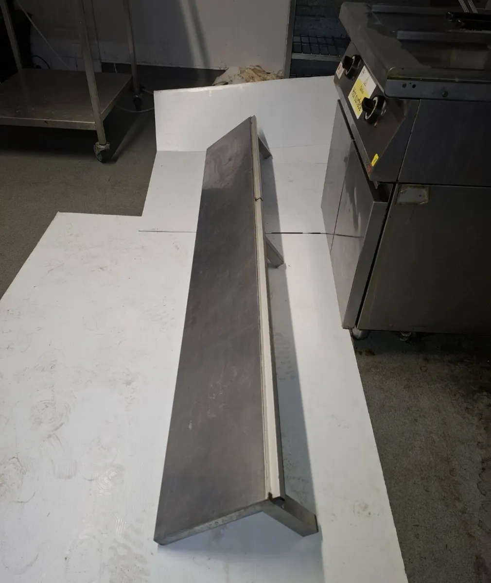 LARGE STAINLESS STEEL SHELF.