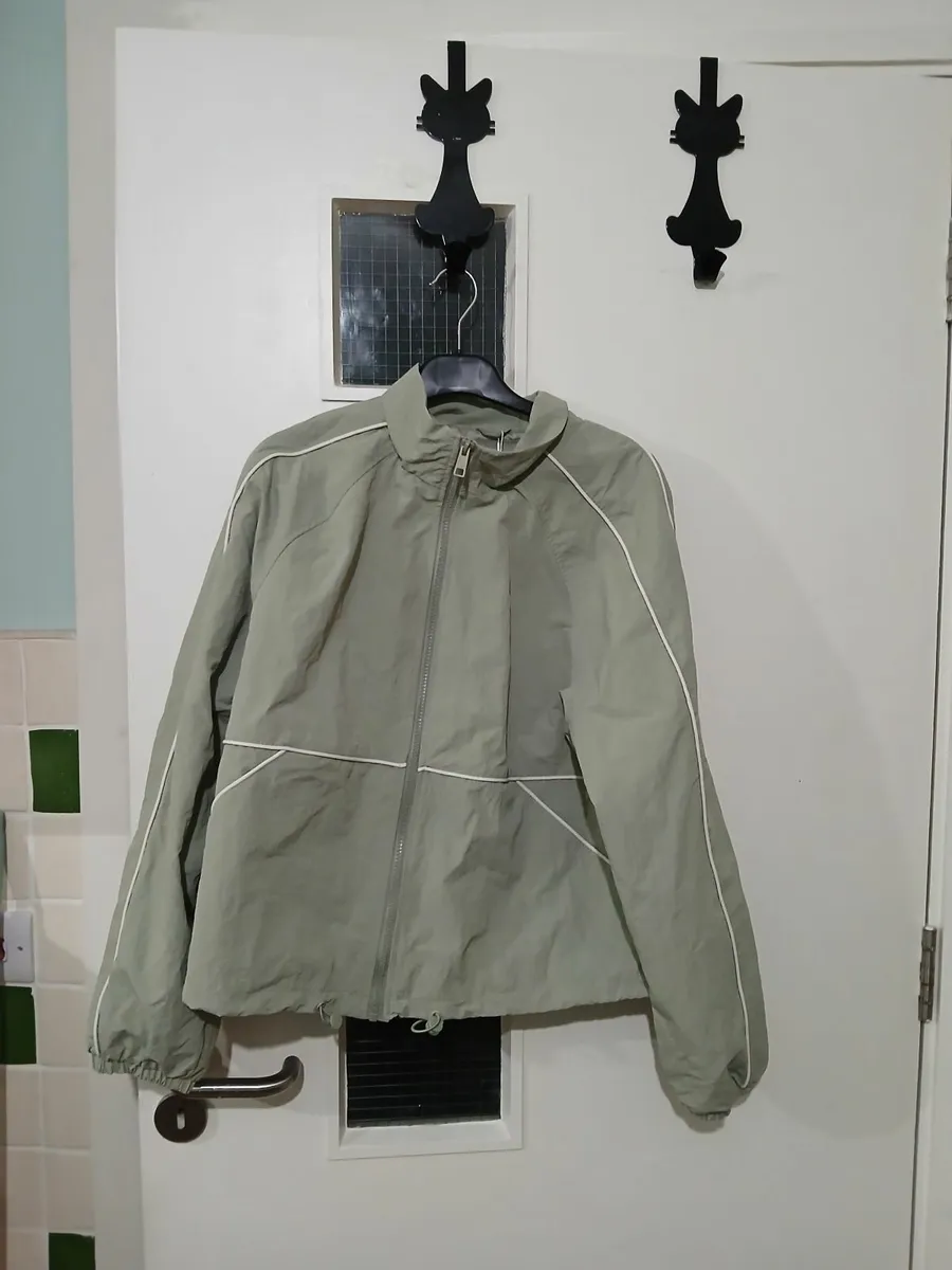 Brand new coat, sized extra small