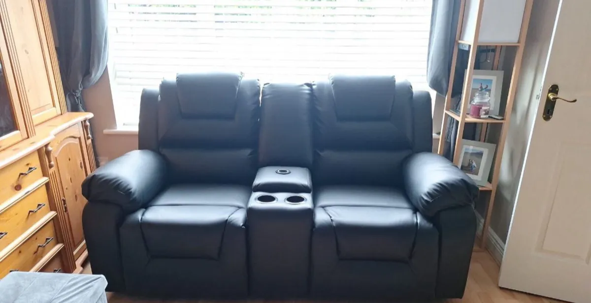 New black leather electric recliner in stock