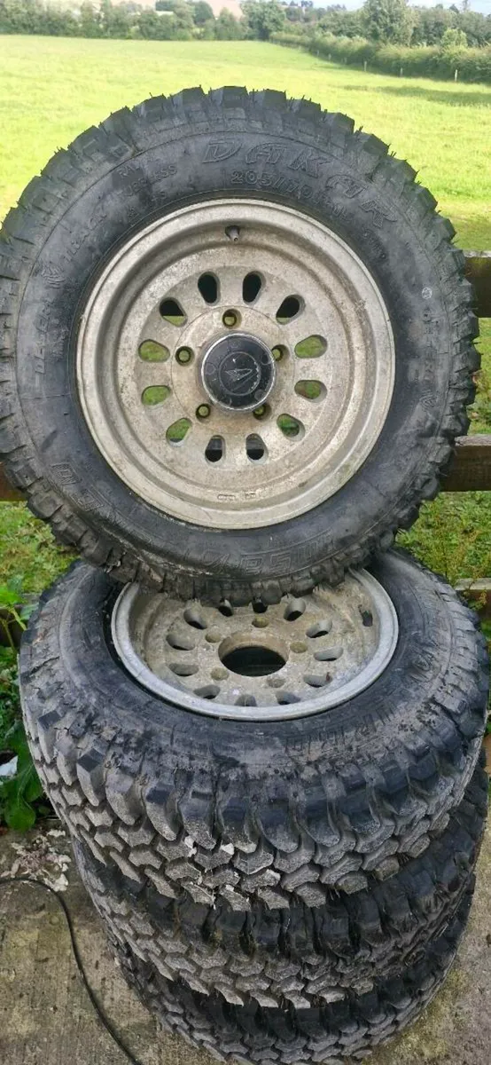 fourtrak/field man alloy wheels with mud tyres - Image 1