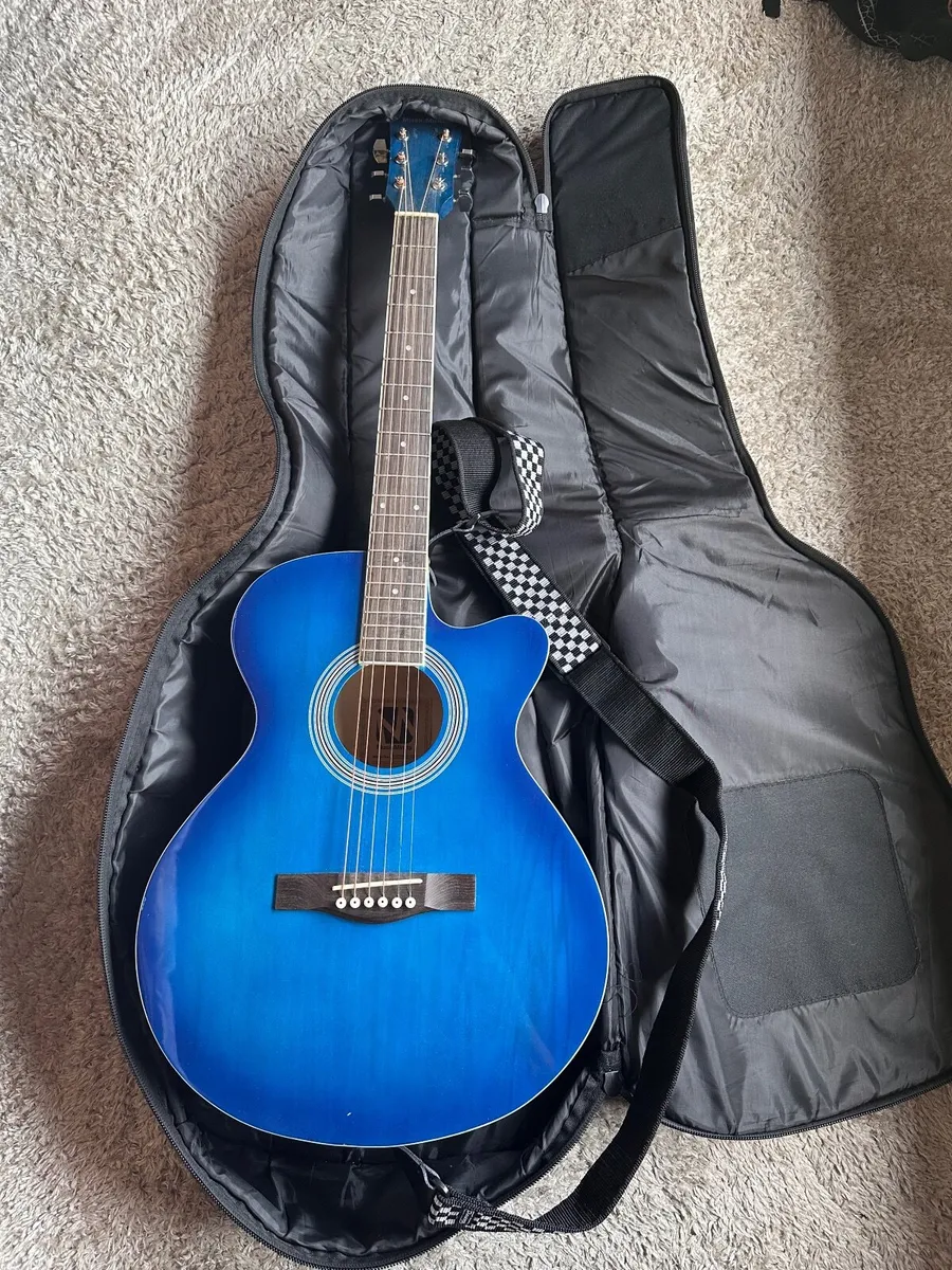 Acoustic Guitar - Image 1