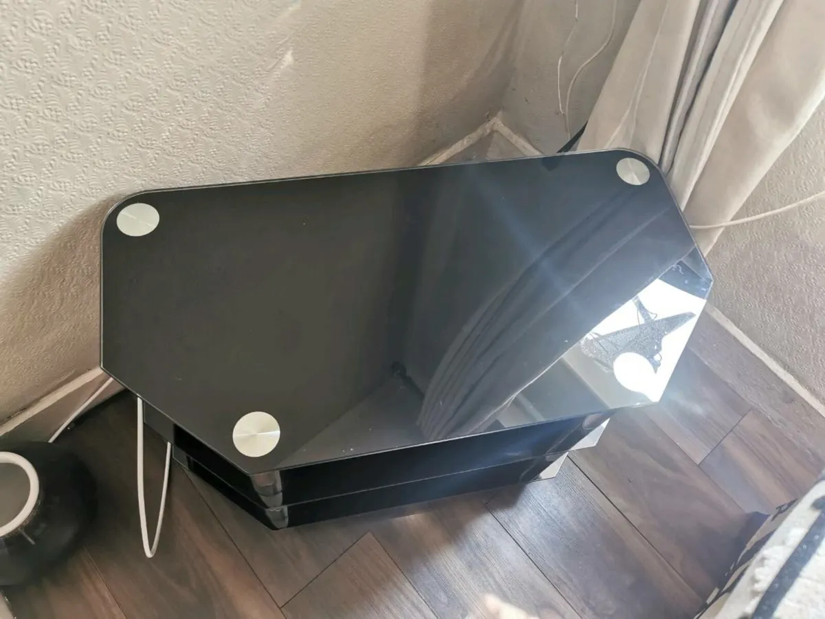 Black glass and silver leg  TV stand - Image 1