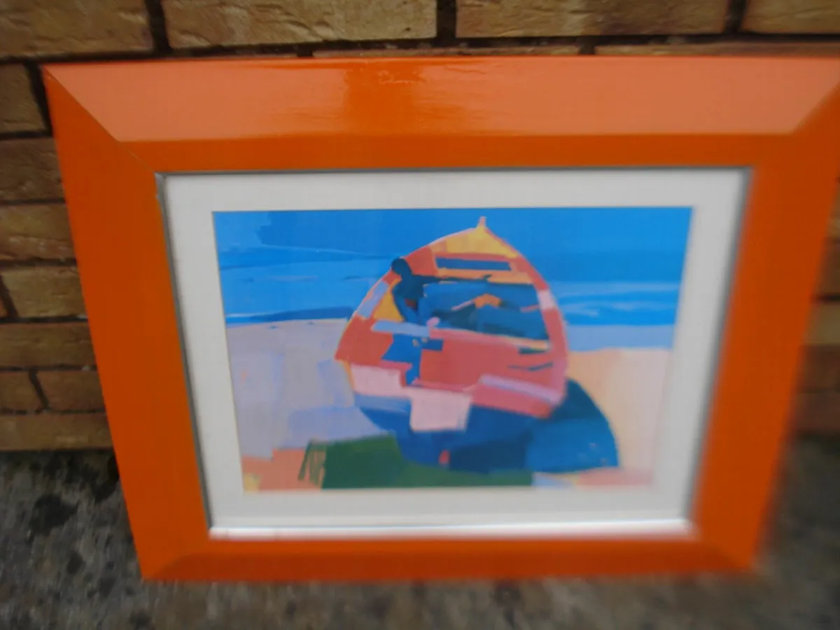 LARGE GLASS FRAMED PRINT BEACHED ROWING BOAT. - Image 1