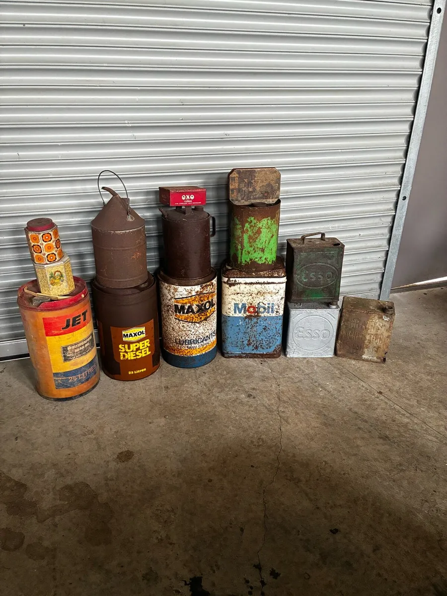 Old oil and petrol cans - Image 1