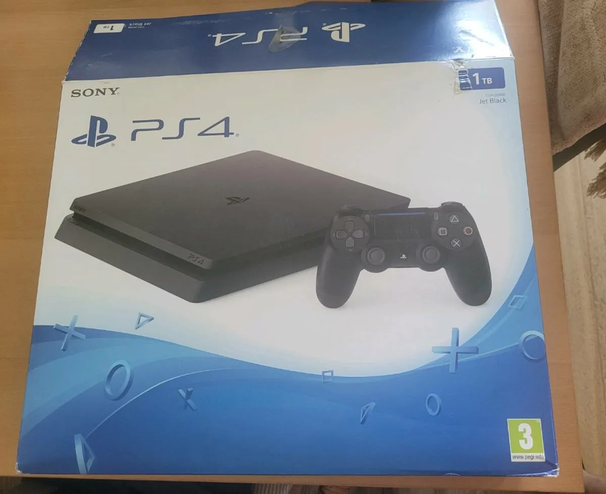 Playstation 4 slim 1tb +extra controller + 8 games - Image 2