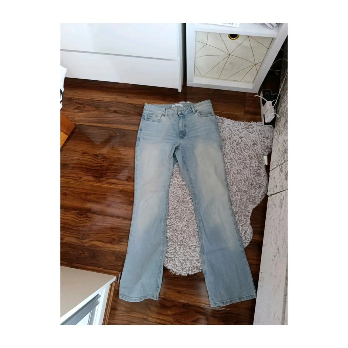 Women's low rise bootcut denim jeans. - Image 1