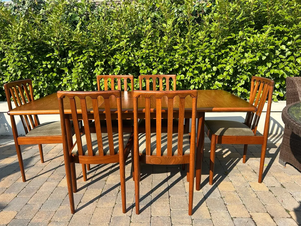 Mid century extendable teak table & 6 chairs - Image 1