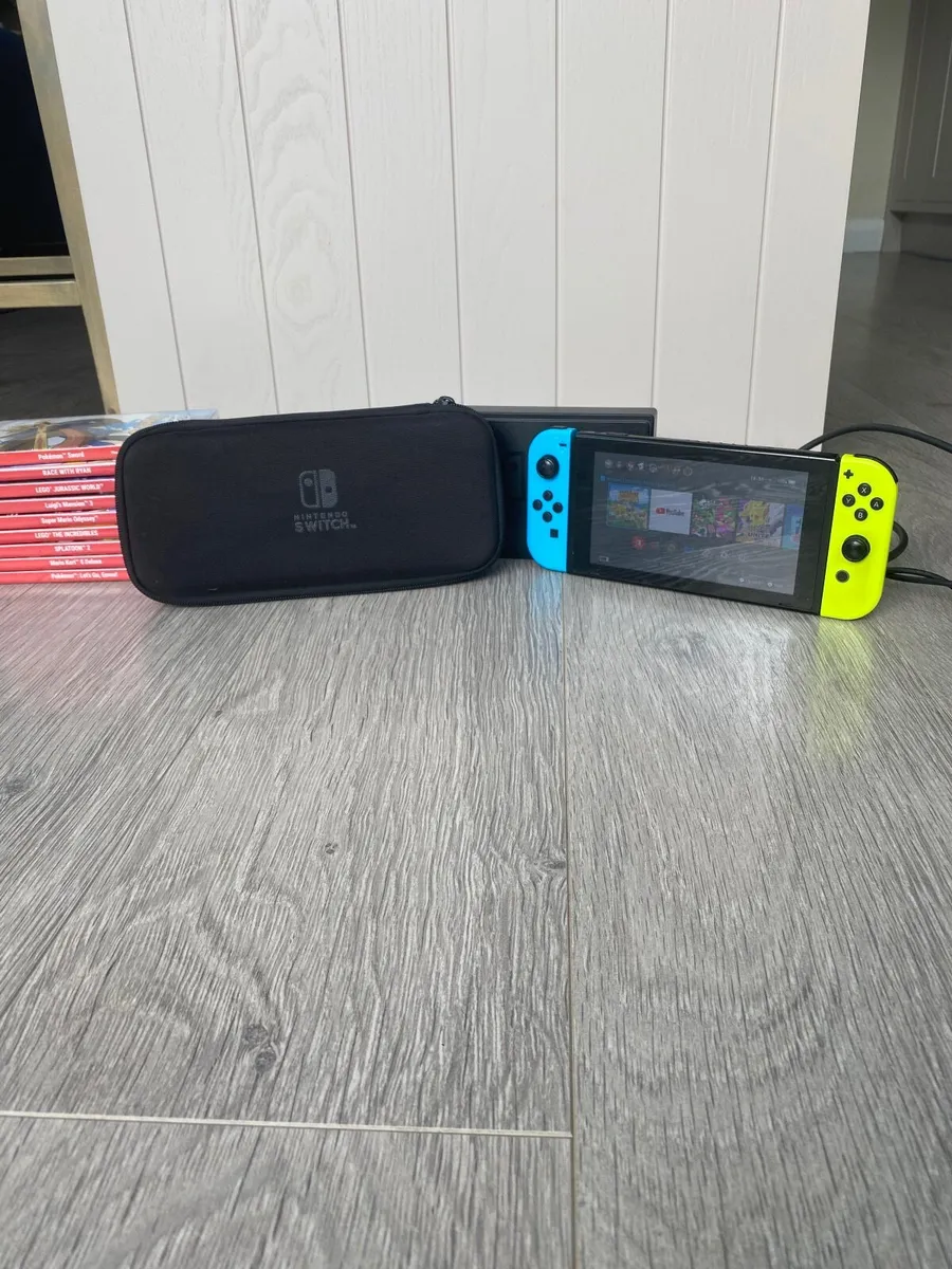 Nintendo switch, charger, stand, case and 9 games - Image 3