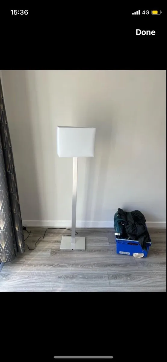 Standing Crome and white lamp
