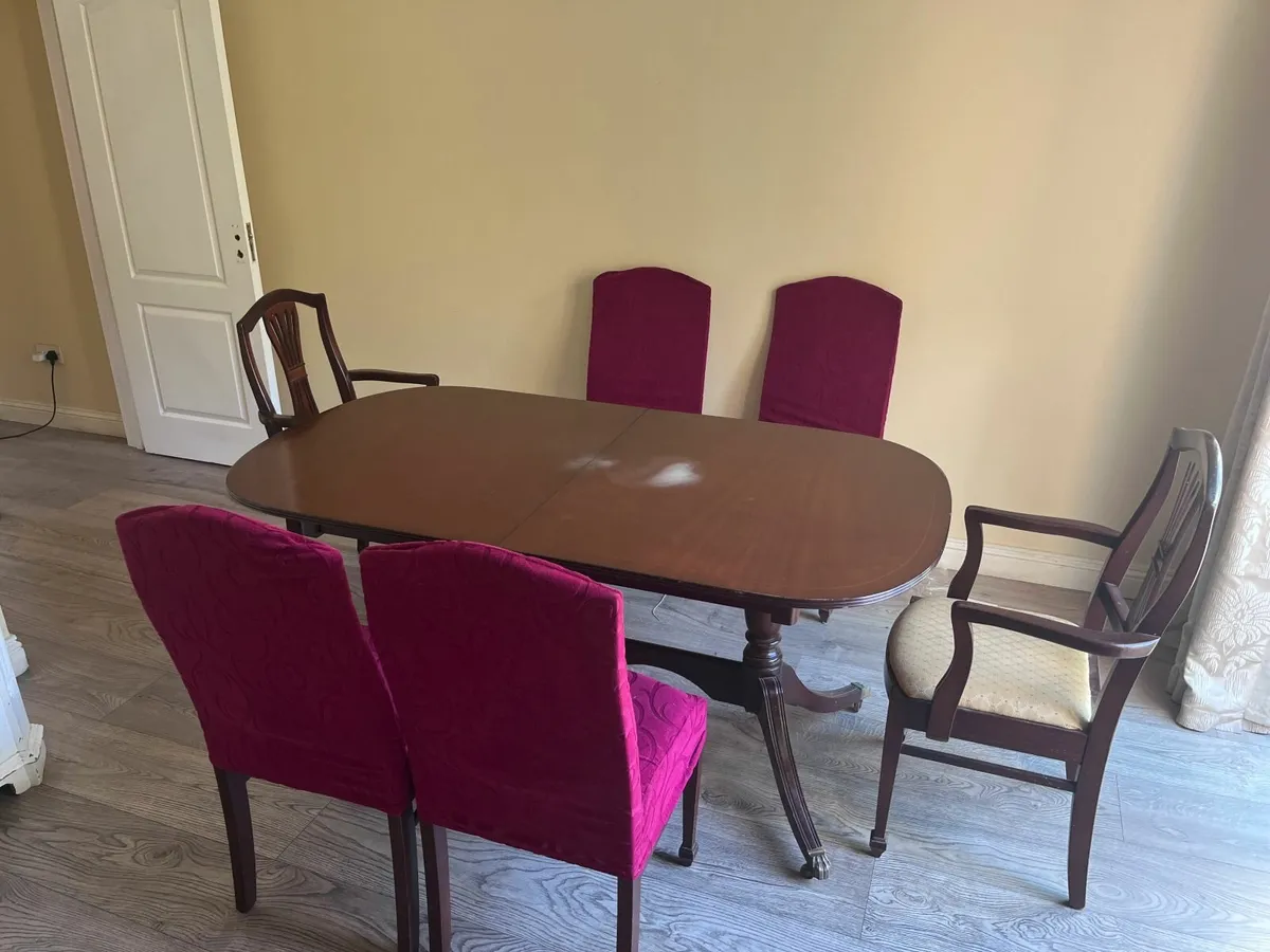 Solid mahogany extendable dining table and chairs
