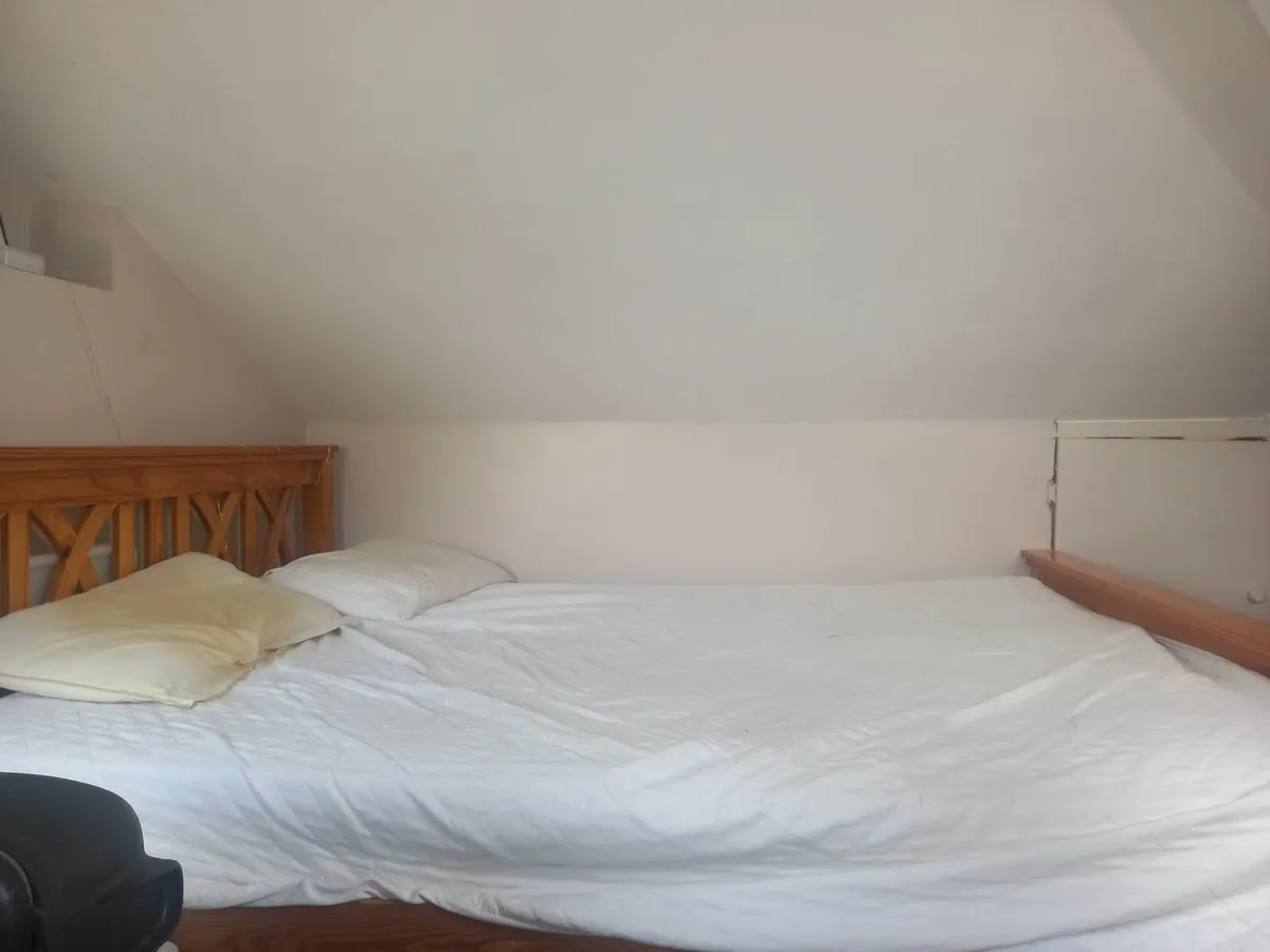 A double bed and a bedside locker - Image 3