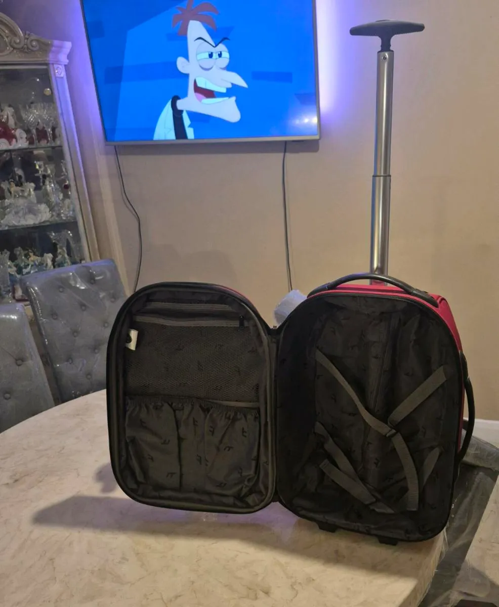 wheel on suitcase for sale in good condition - Image 1