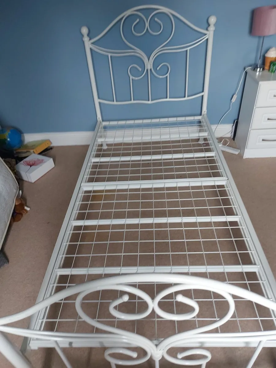 White metal bed frame. - Image 1