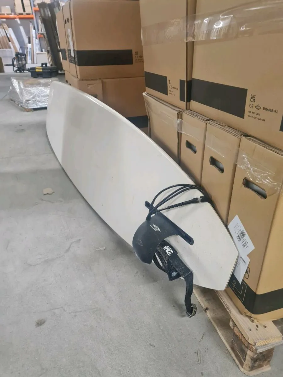 Surf board, wet suit - Image 1