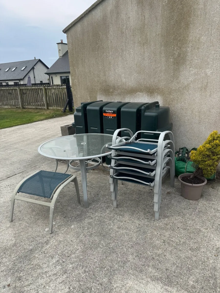 Patio set - table, 4 chairs and foot stool. - Image 1