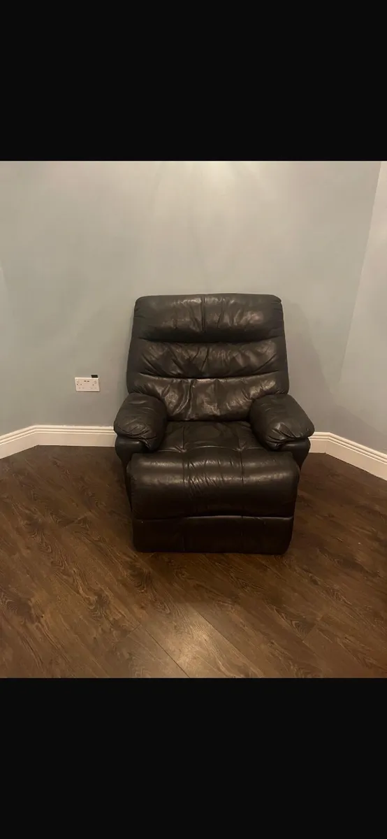 Two leather recliner seats