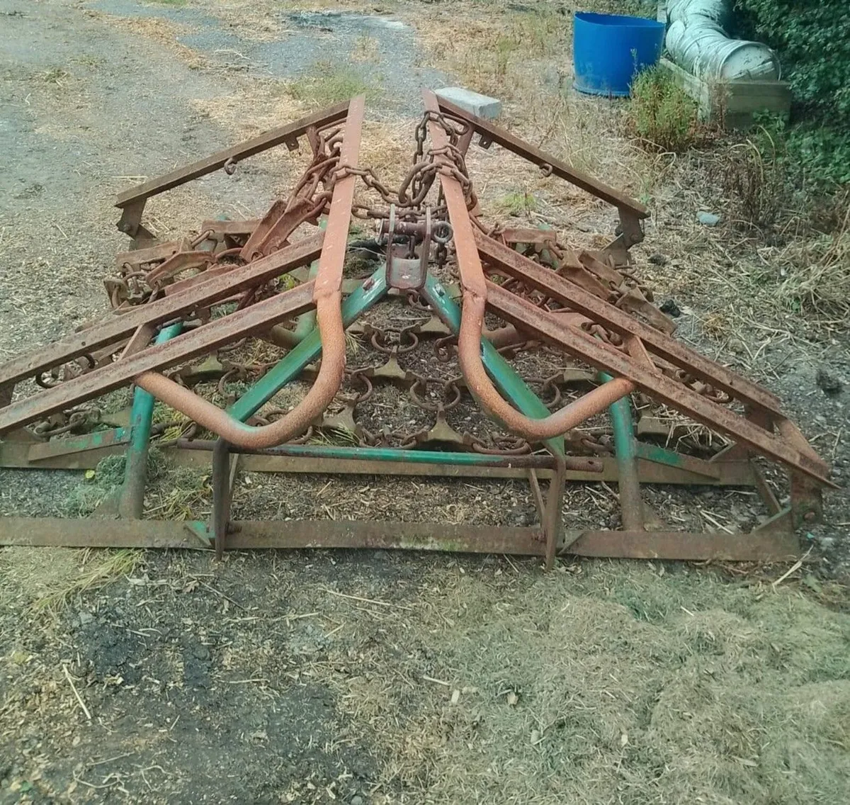 Grass harrow