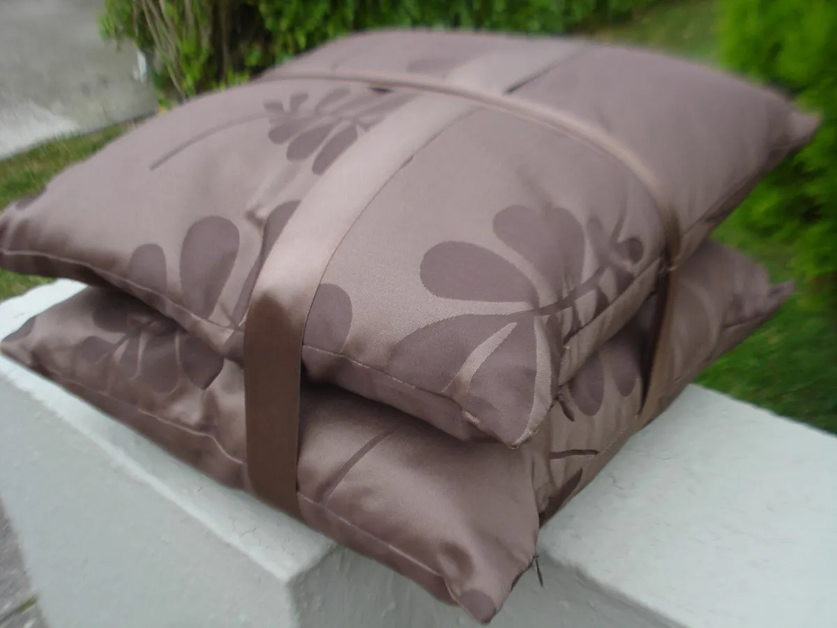 2 NEW BROWN CUSHIONS. - Image 1