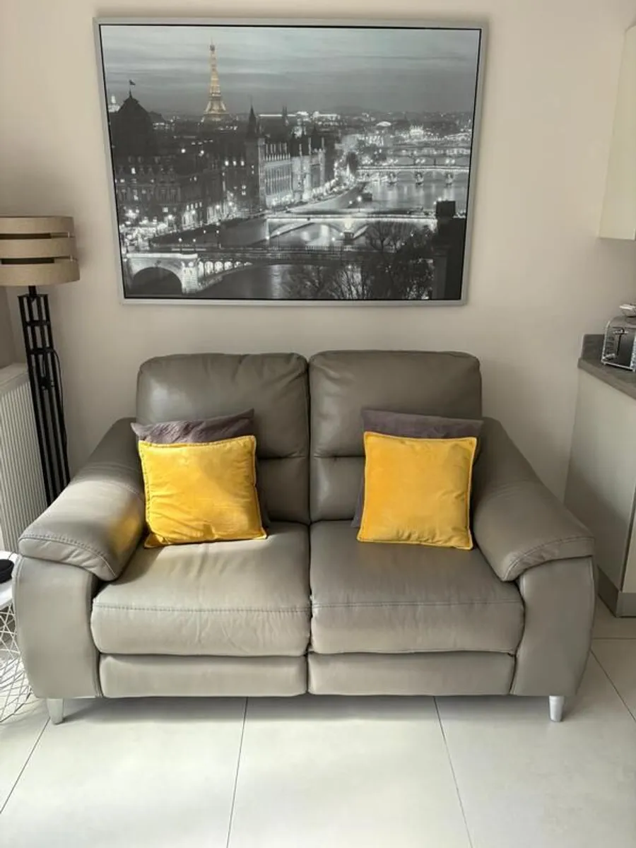 Harvey Norman Taupe leather 3 & 2 seater recliners with charging ports - Image 1