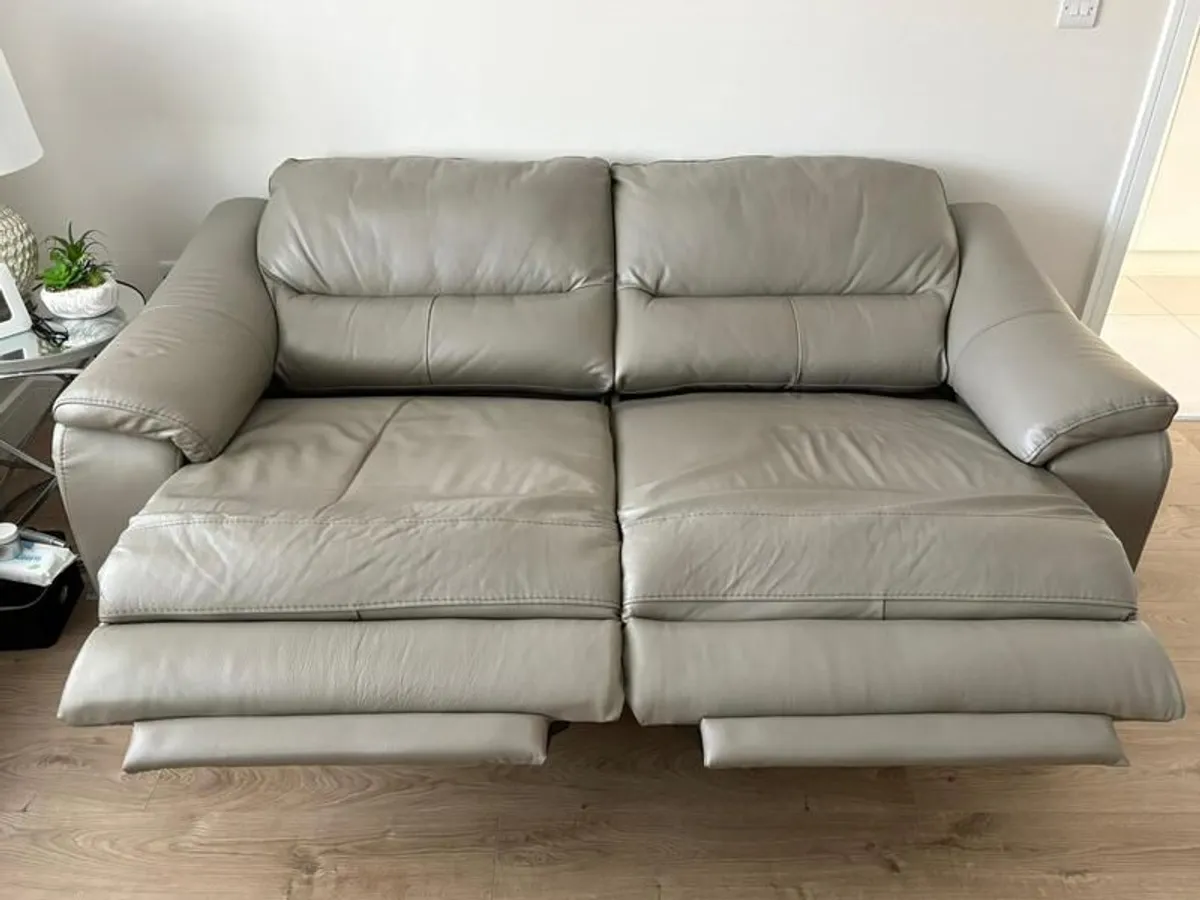 Harvey Norman Taupe leather 3 & 2 seater recliners with charging ports - Image 4