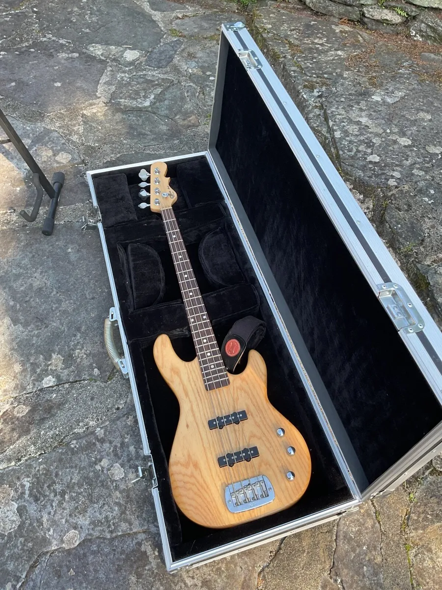 Bass guitar with flight case - Image 1