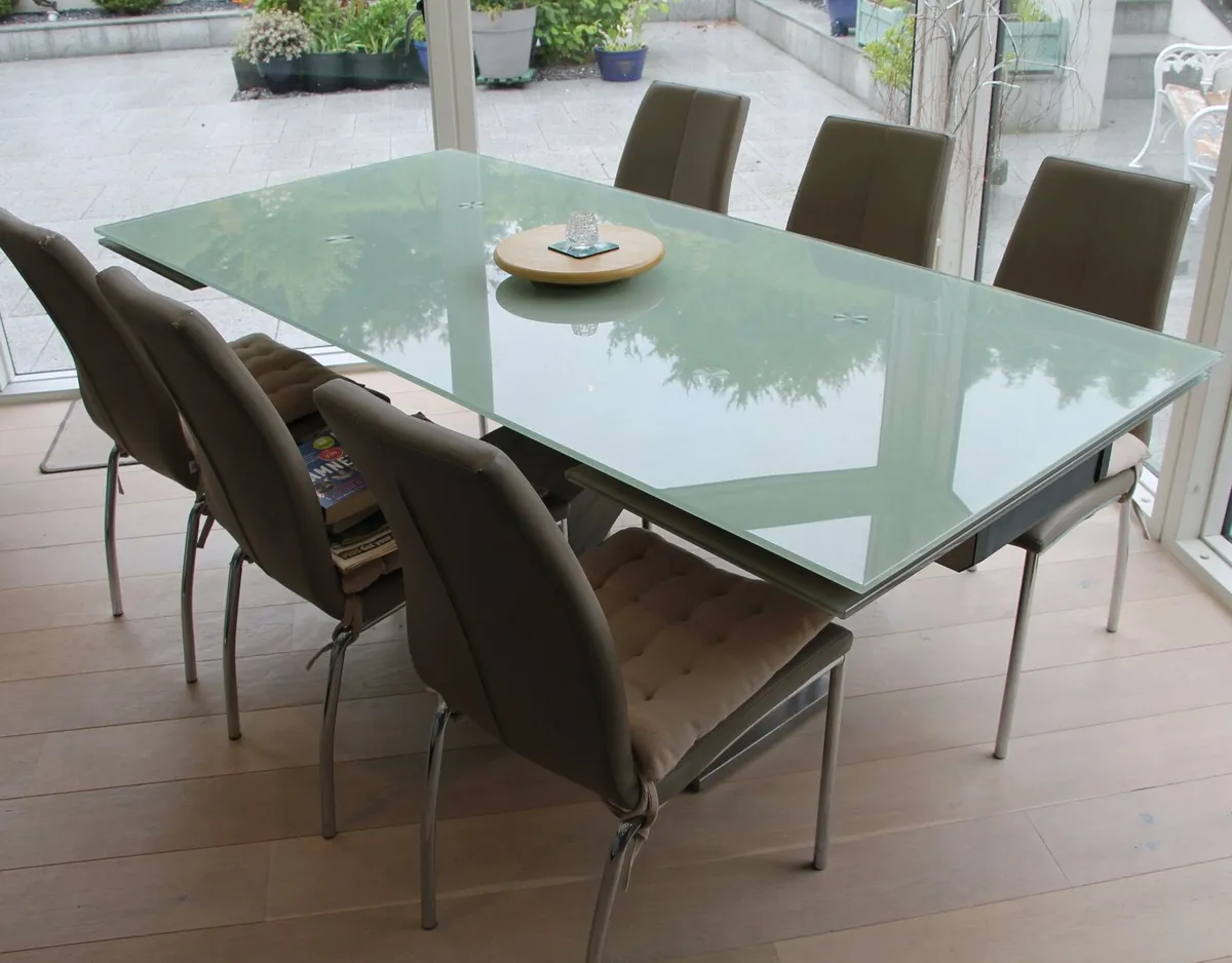 Dining Table and 8 leatherette chairs