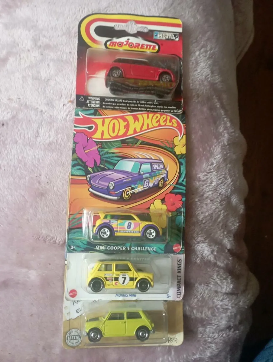 A COLLECTION OF HOT WHEELS DIE-CAST MINI COOPER - Image 1