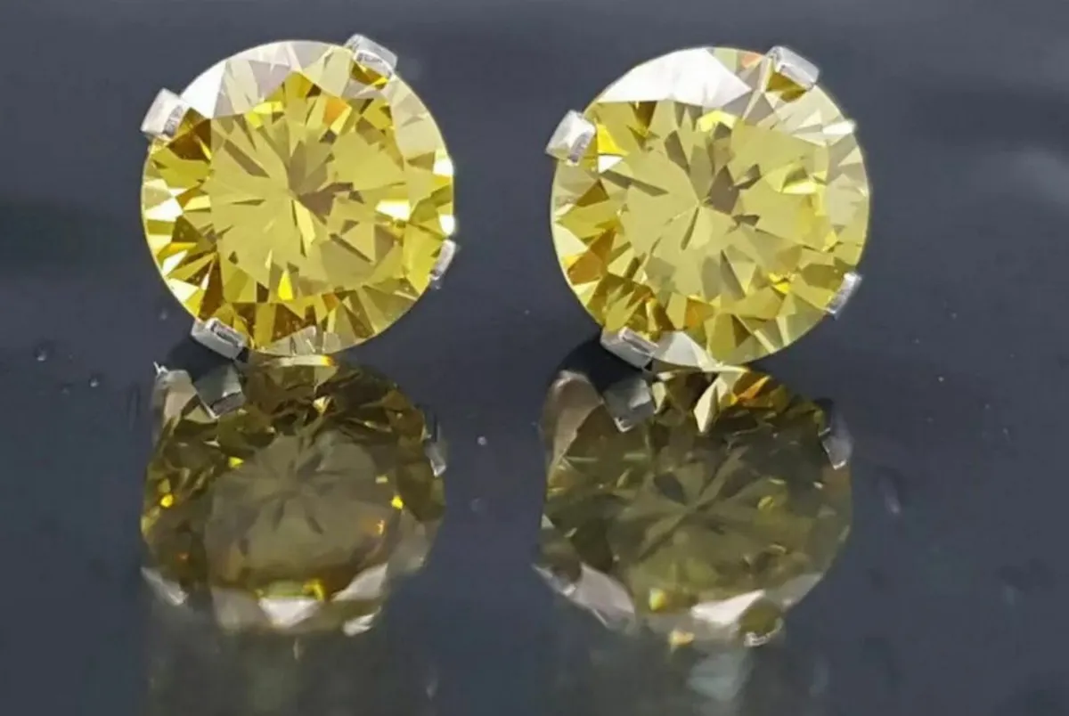 Vintage 'Champagne Sapphire' Silver Solitaires - Image 3
