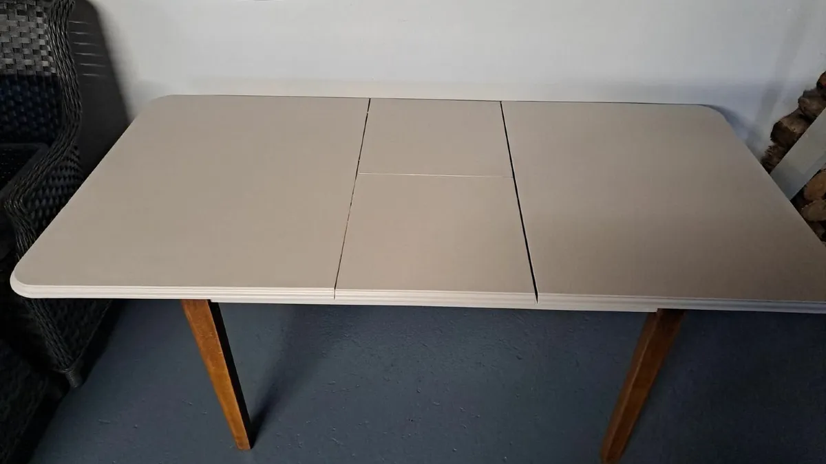 Walnut extendable dining table - Image 1