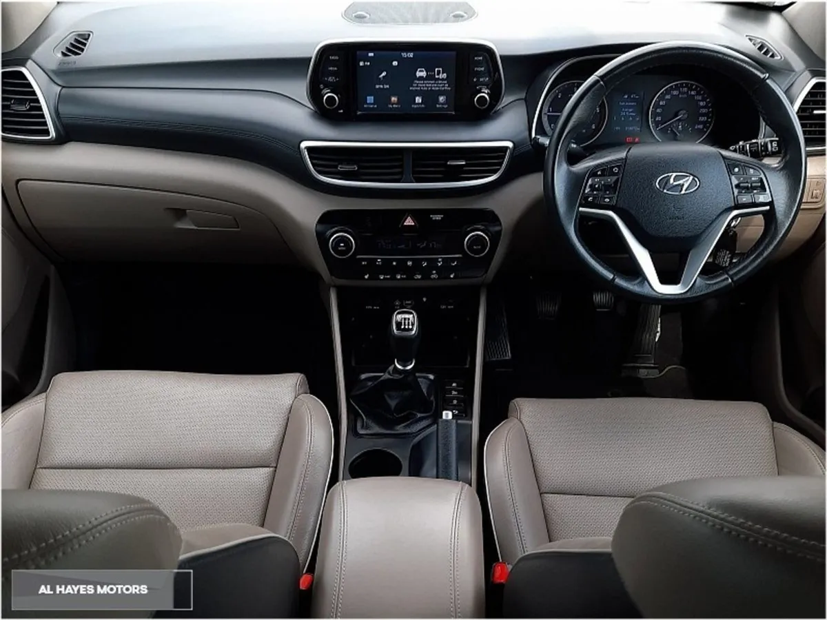 Hyundai Tucson  full Leather heated Seats driving - Image 2
