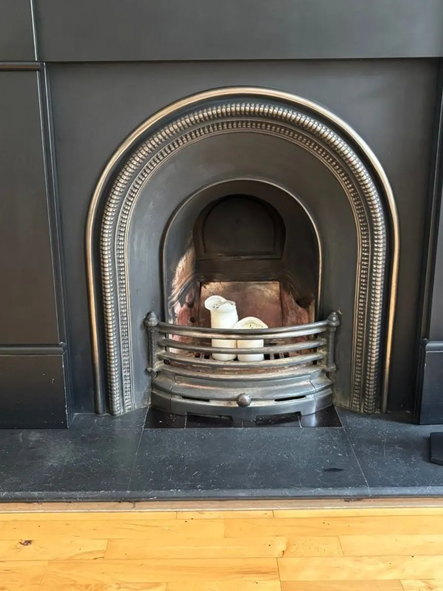 Fireplace surround and hearth. - Image 1