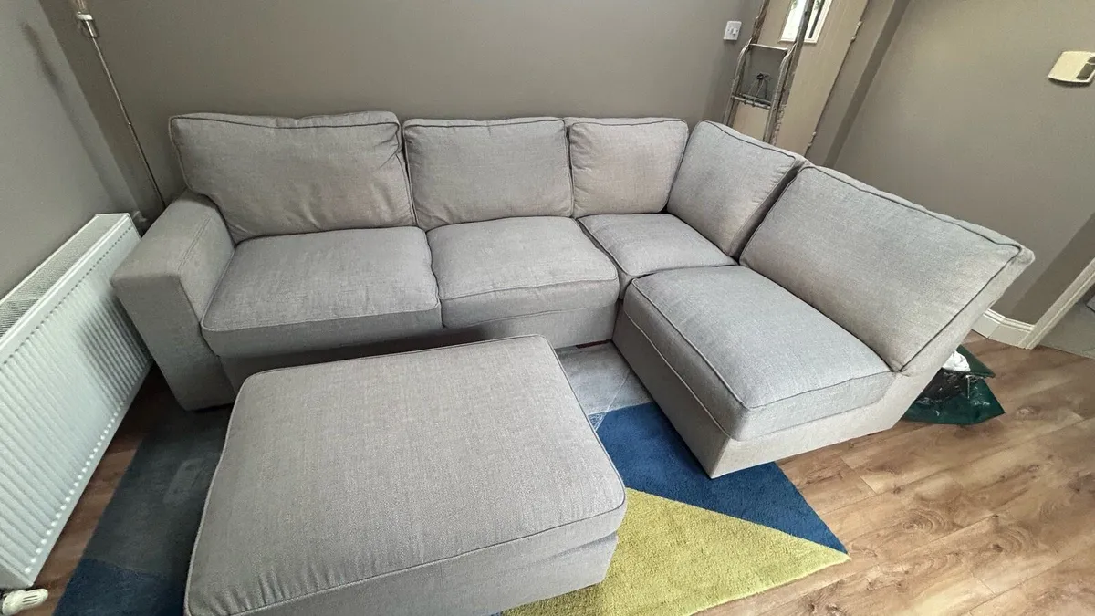 Grey corner sofa with ottoman