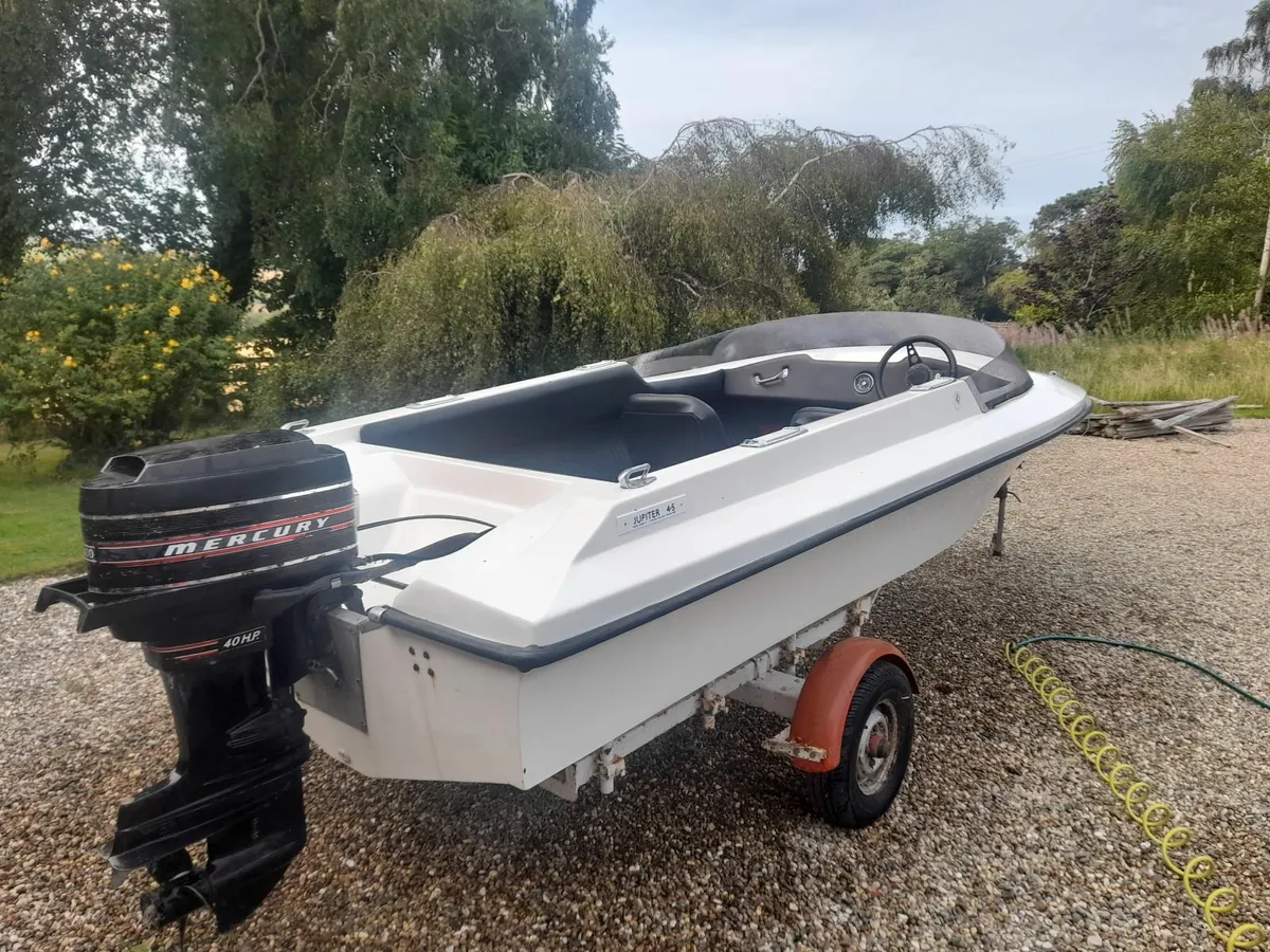 Family Speedboat with Outboard and Trailer - Image 4
