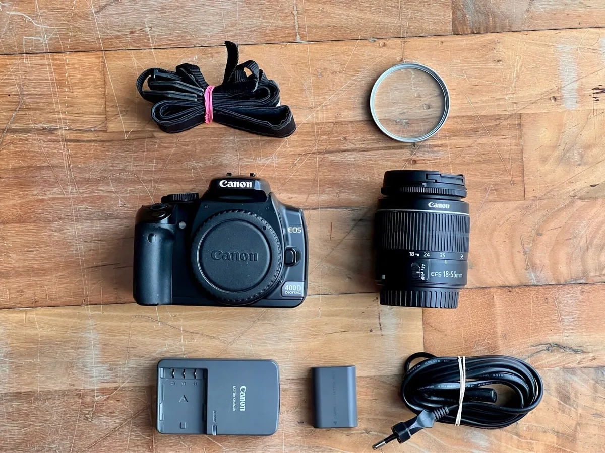 Canon 400D with 18-55mm III lens and accessories - Image 1