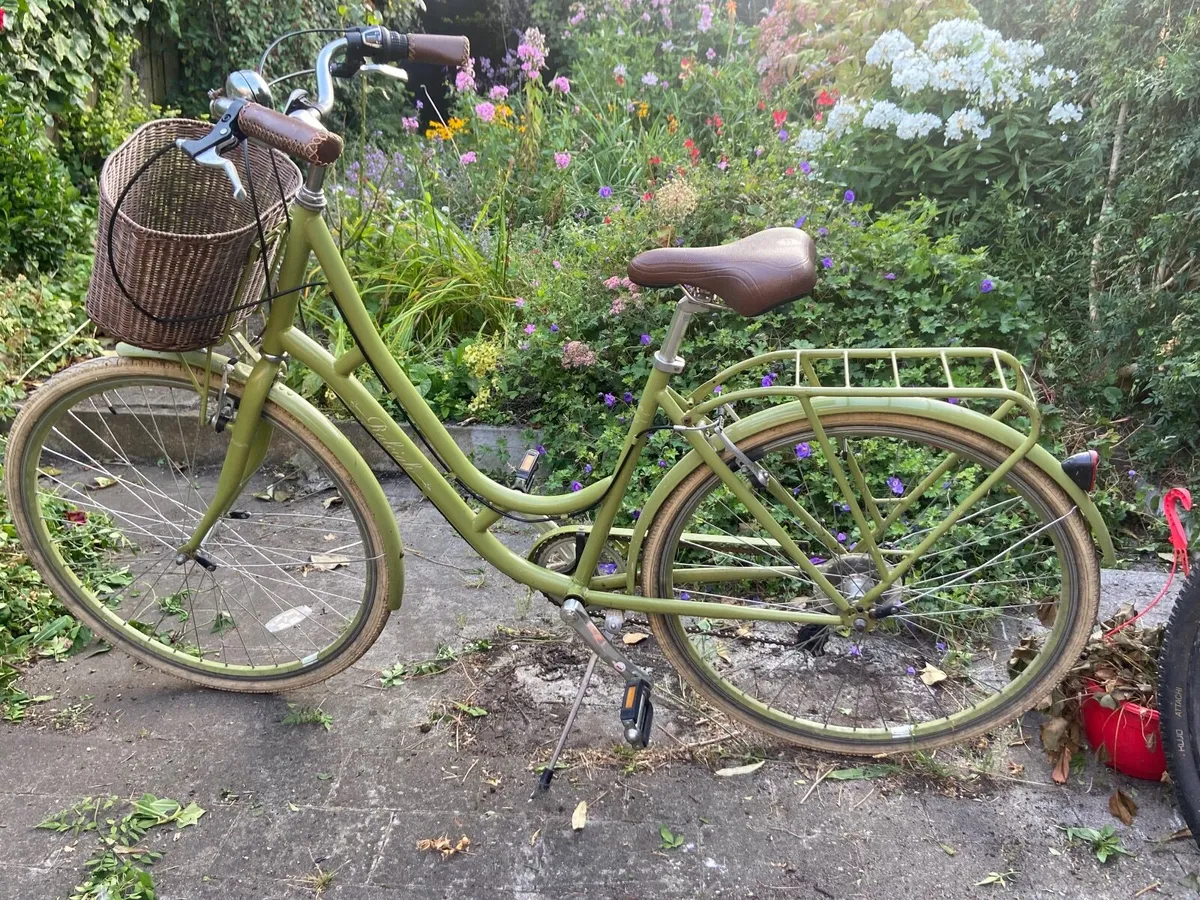 Women’s Raleigh bike - light green, wicker basket - Image 1