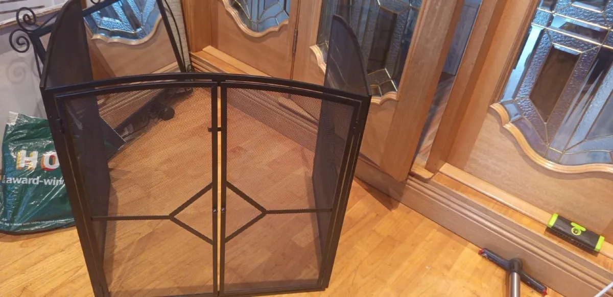 Folding black mesh fireplace screen with a three-p - Image 2