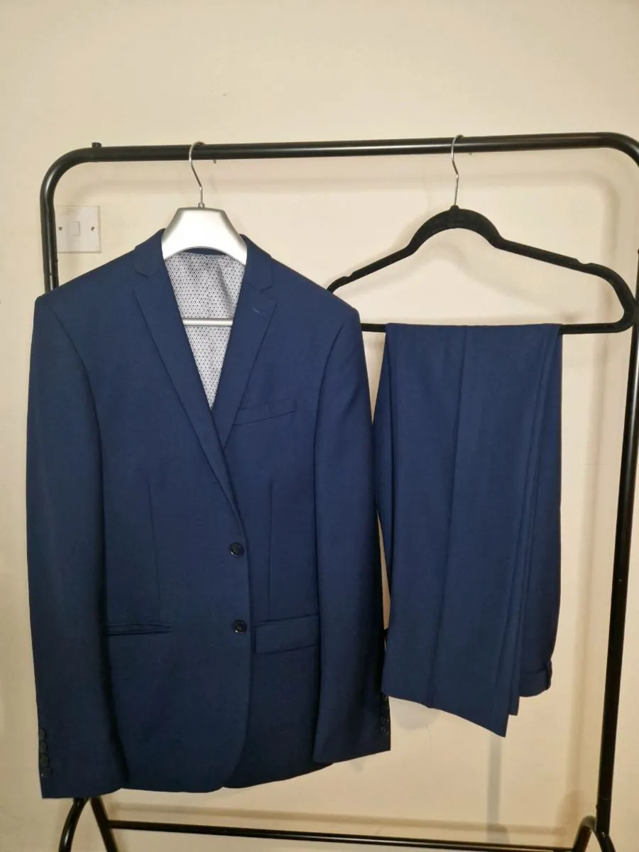 2 Piece Suit Navy Blue - size 34. Worn only once. - Image 1