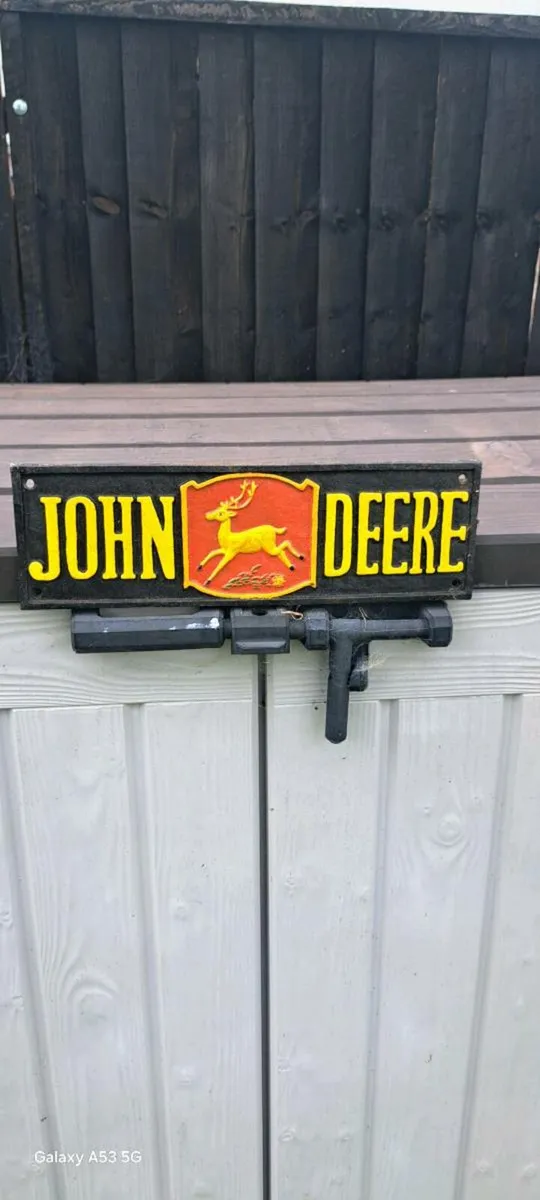 Large  john deer cast iron sign
