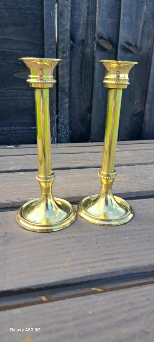 2 small  brass candle stick holders