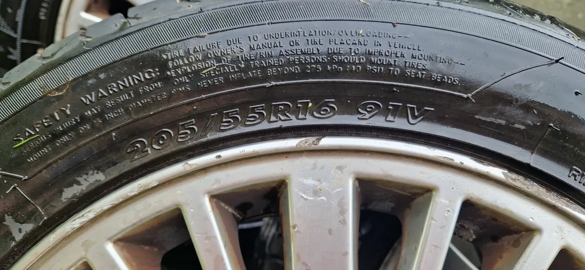 Volvo alloy wheels with tires - Image 2