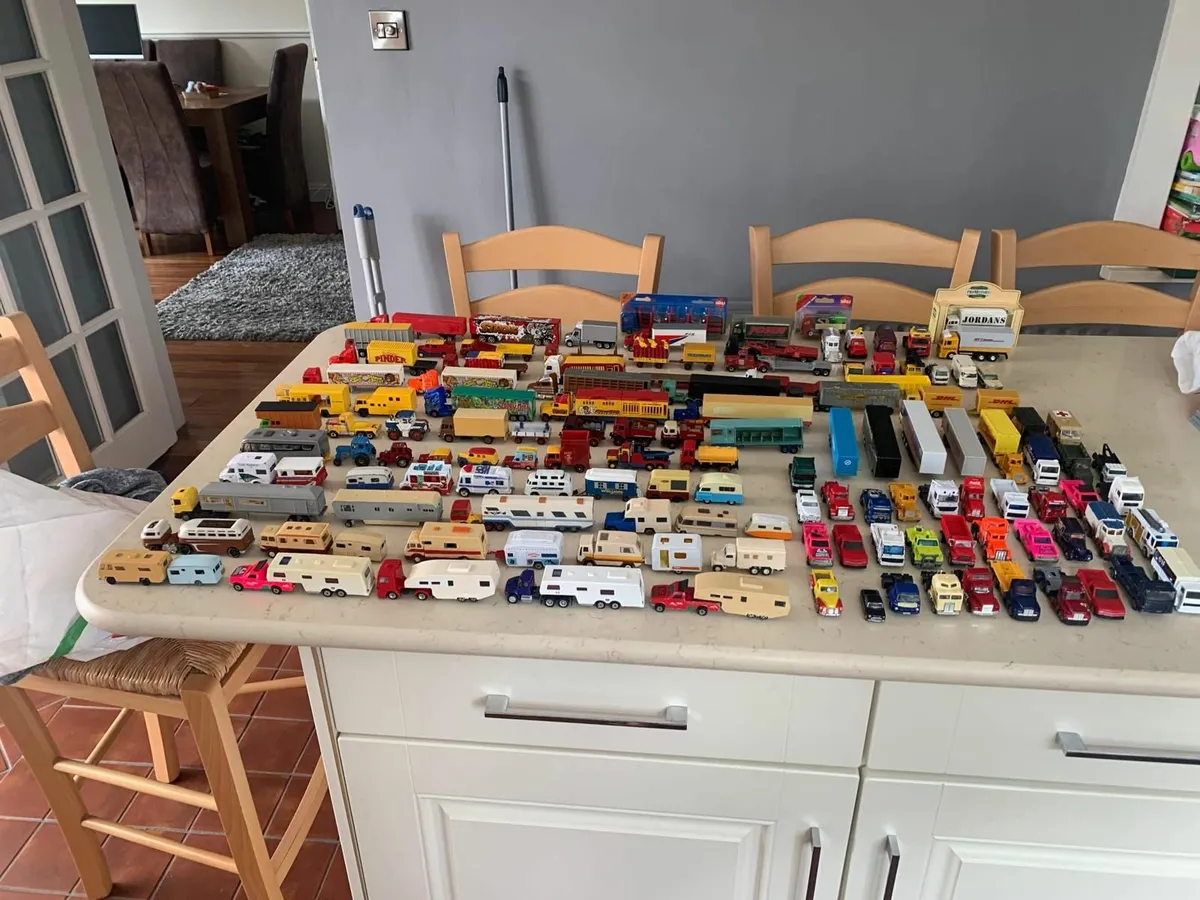 Model trucks, trailers and circus wagons.