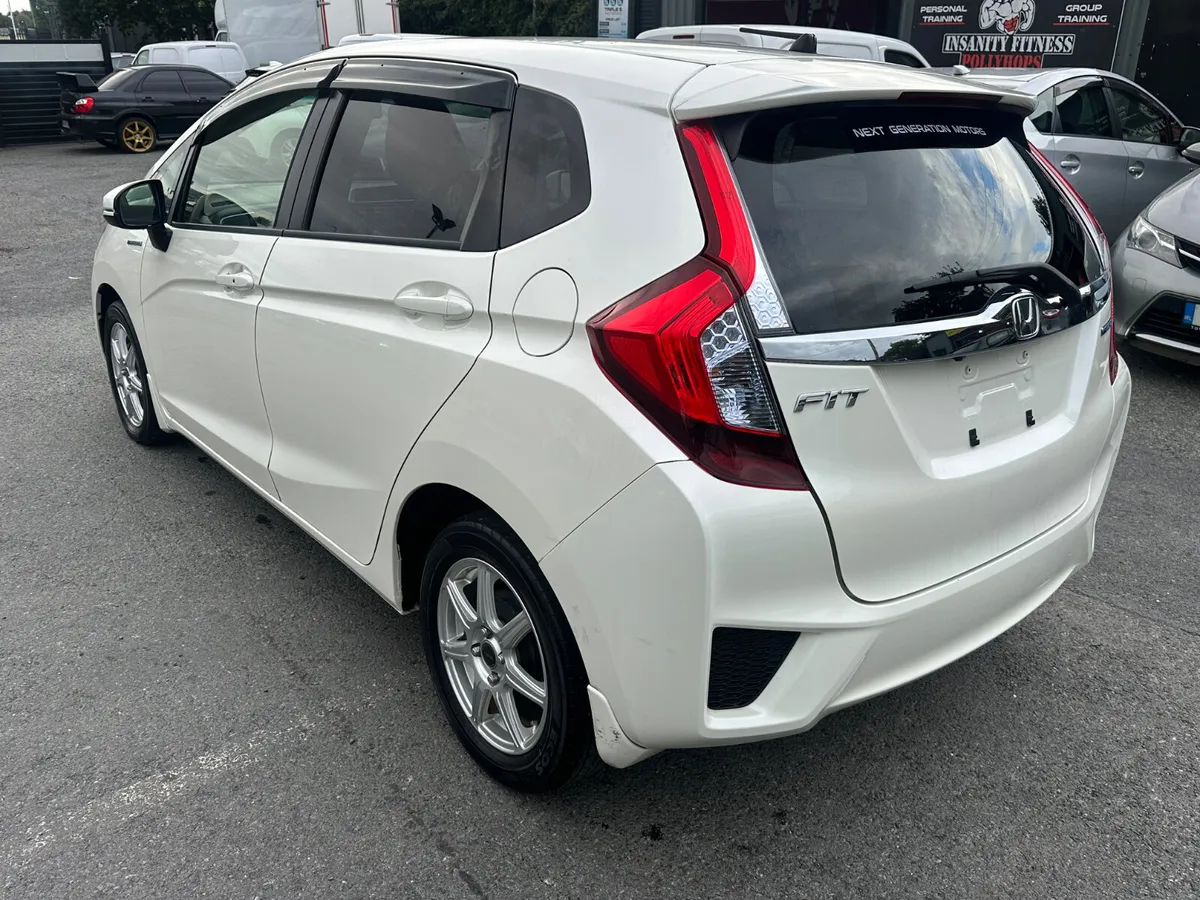 HONDA FIT 2014 1.5L HYBRID LOW MILES HALF LEATHER - Image 4
