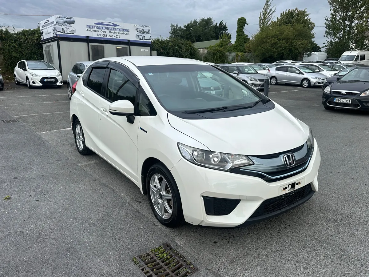 HONDA FIT 2014 1.5L HYBRID LOW MILES HALF LEATHER - Image 1