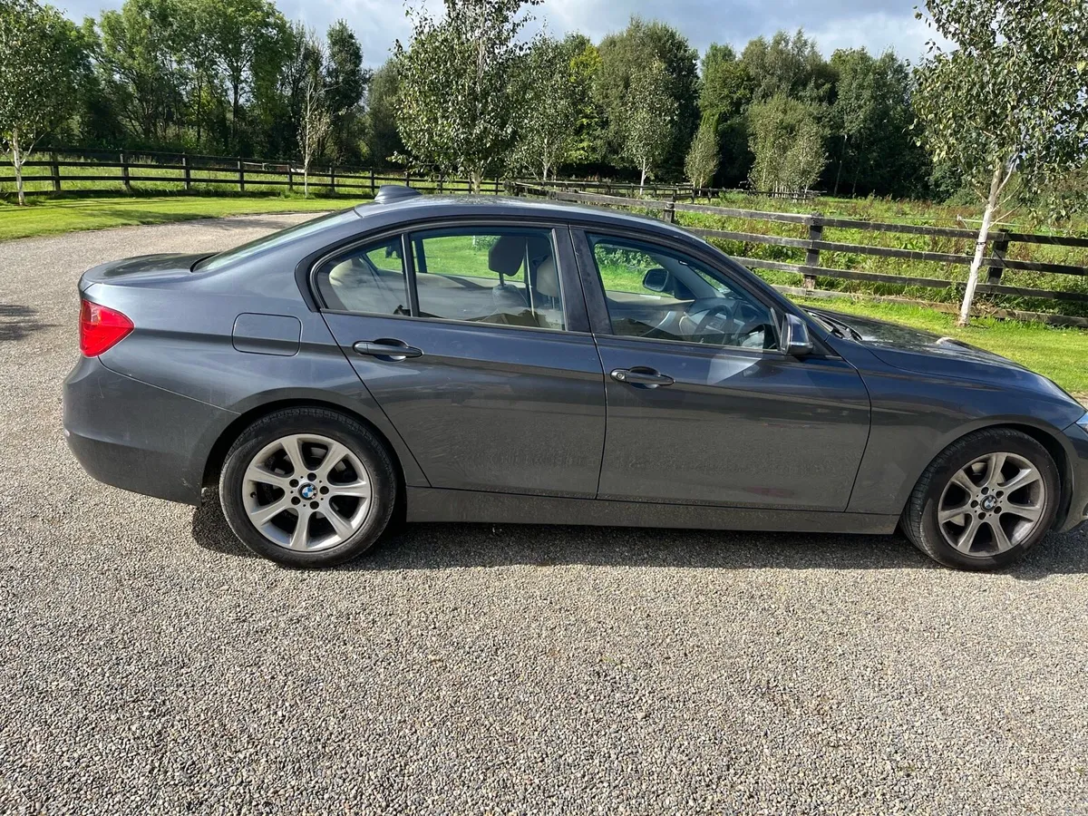Grey 2013 3 series BMW - Image 1
