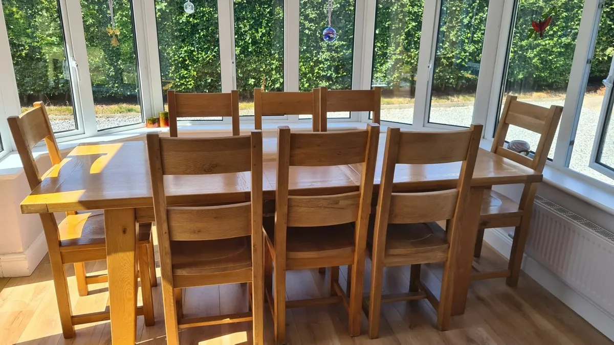 Solid oak 8 or 6 seater table and chairs - Image 2