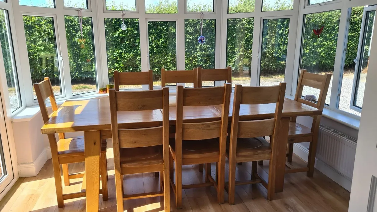 Solid oak 8 or 6 seater table and chairs - Image 4