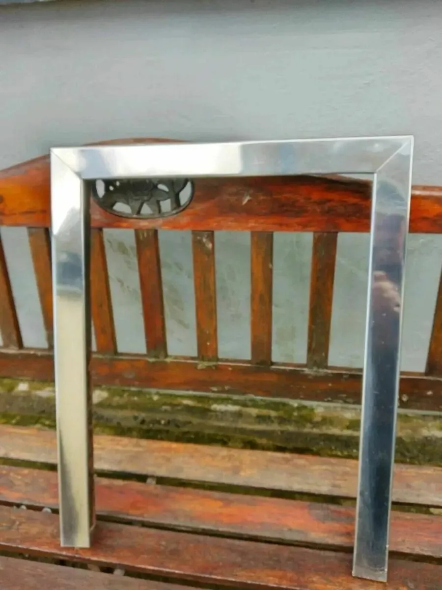 Vintage 16" chrome finish fire trim