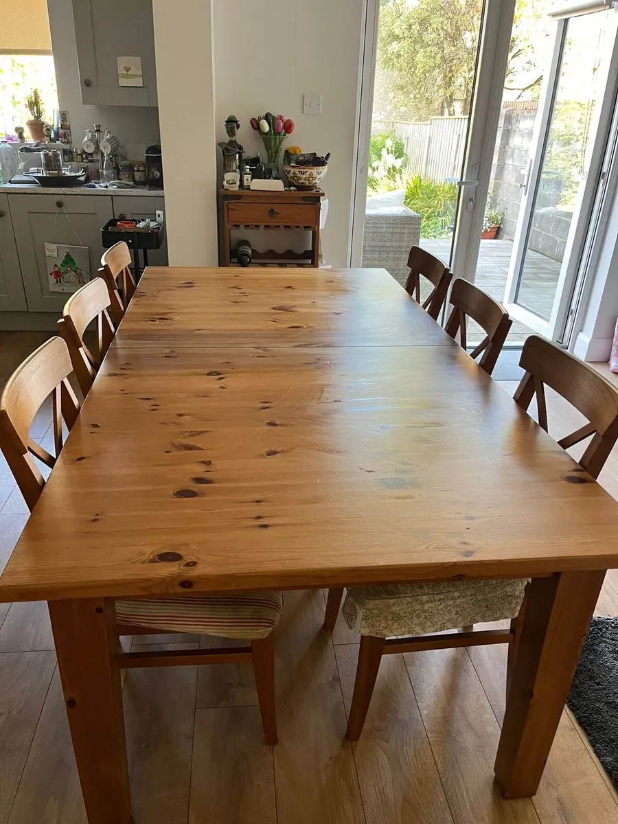 Extendable wooden dining table and chairs - Image 2